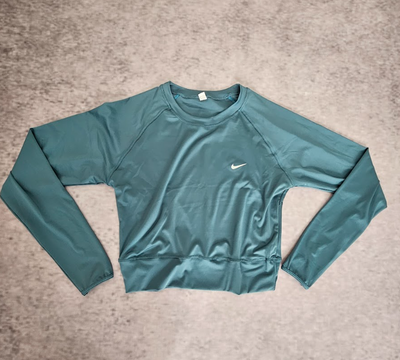 CROP TOP NIKE - PETROLEO