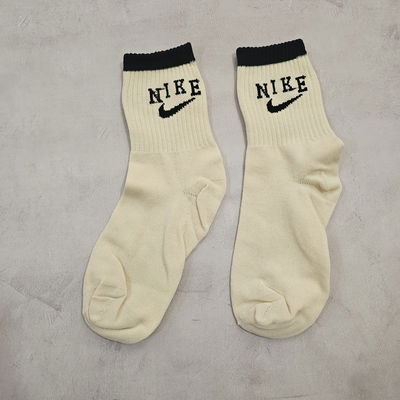 MEDIAS nike manteca y negro