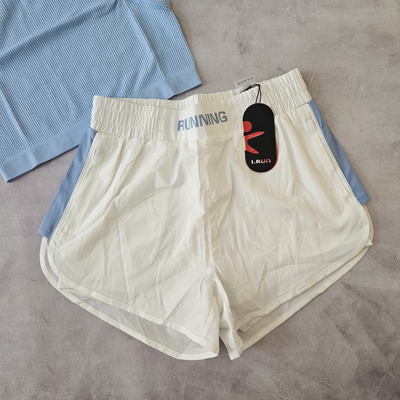 SHORT IRUN - RUNNING - BLANCO
