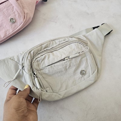 RIÑONERA GRIS DEPORTIVA