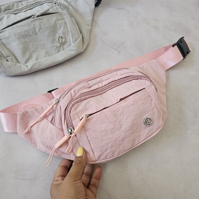 RIÑONERA ROSA DEPORTIVA