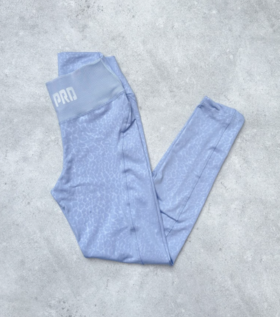 CALZAS GOFRADA NIKE PRO - CELESTE