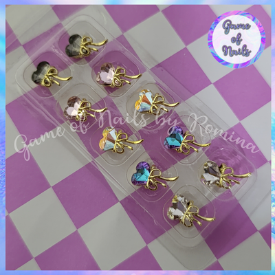 Aplique cristal corazon con moño x 10u