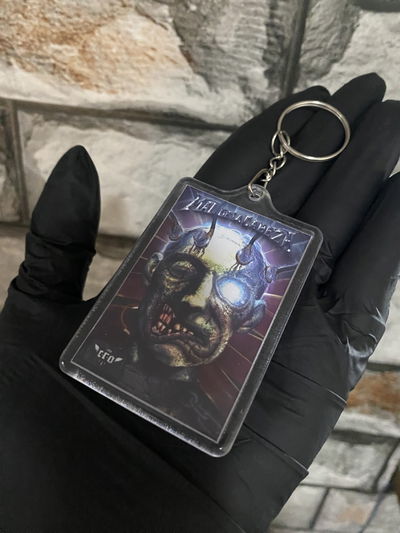 Llavero acrilico “Mal de la cabeza” CRO