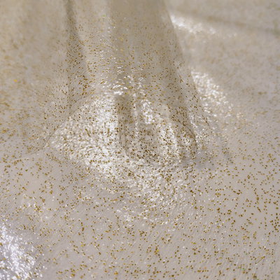 NYLON GLITTER DORADO ( 50 CM X 140 CM )