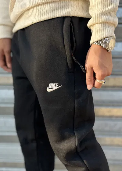 Jogging c/ puño NK | NEGRO