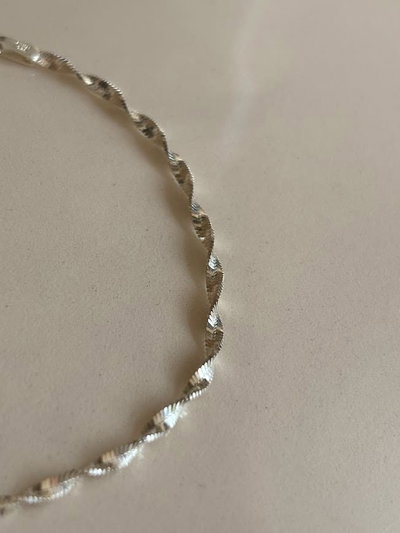 Pulsera torzada de plata