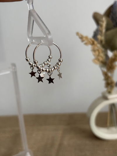 Argollas bolitas y estrellas