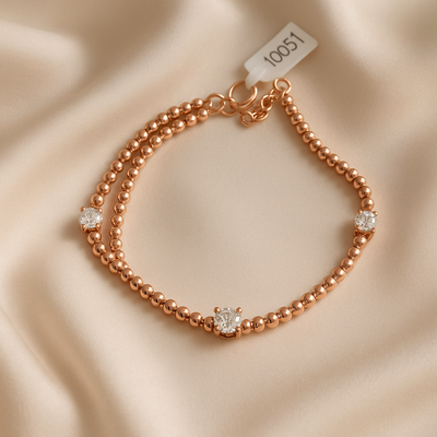 PULSERA ORO ROSE CON BOLITAS DE PLATA Y ZIRCONAS