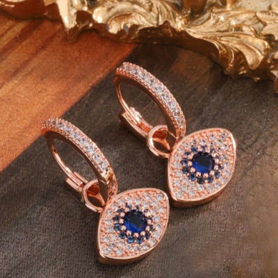 Aros Ojo Turco – Baño Oro Rose con Zircones