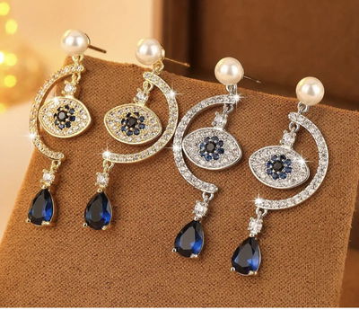 Aros Ojo Turco en Swarovski – Baño Oro Rose