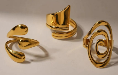 ANILLOS DORADOS ACERO QUIRURGICO