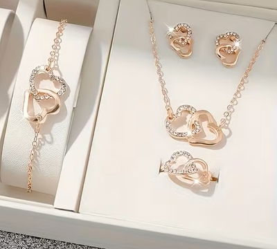 Conjunto Rose Corazón Entrelazado – Pulsera + Aros + Collar + Anillo (Micropavé)