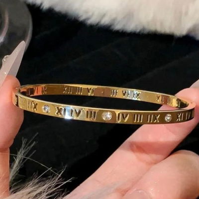 PULSERA RIGIDA DORADA