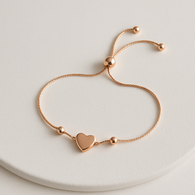PULSERA CORAZÓN – Plata 925 bañada en oro rose, regulable