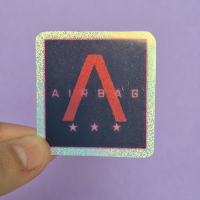 AIRBAG *** -holo brillo-tinta expandida-