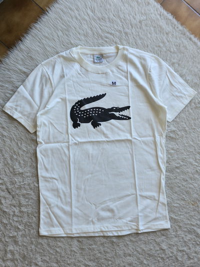 Remera La coste ( M - L) 