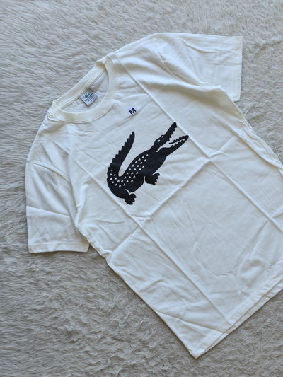 Remera La coste ( M - L) 