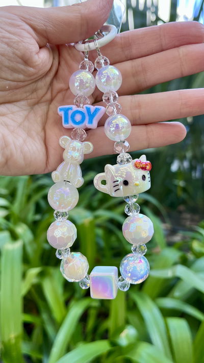 Strap con charms y correa - Hello Kitty 