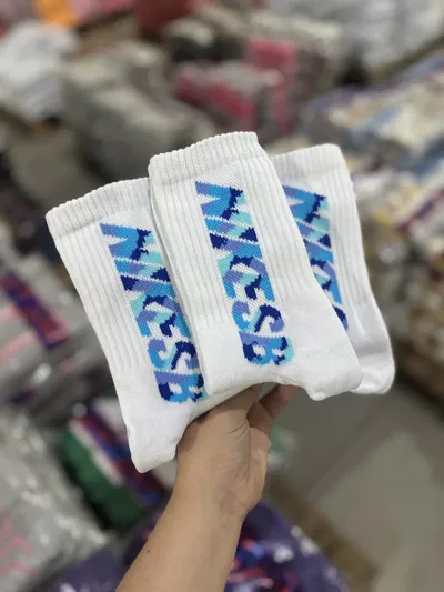 Media Tenis adulto Nike azul/celeste