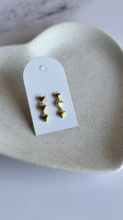 Aros corazones dorados 