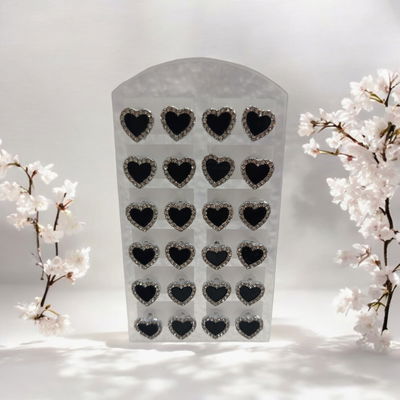 Aros de corazón negro con brillo 