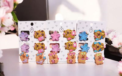 Set boches flor, hebillas y colitas capibara 
