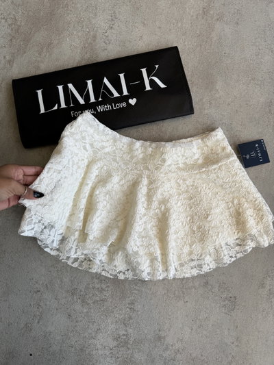 SHORTS POLLERA 