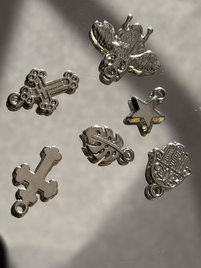 Dije estrella x unidad