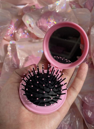 Cepillo de cartera con espejo COLOR ROSA