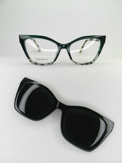 Clip on acetato Veyra 