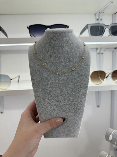 CADENA FINITA CON BOLITA  DE ACERO DORADO