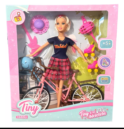 Muñeca con bicicleta 
