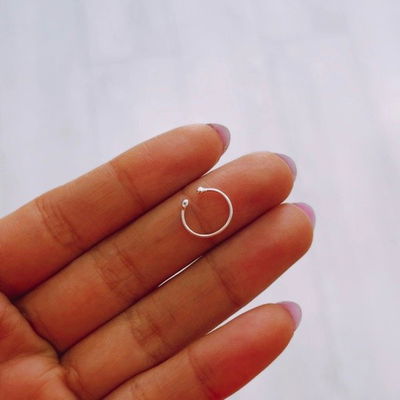 Aro Tini (falso piercings)