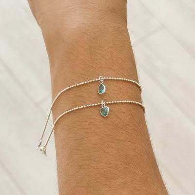 Pulseras con Dije Celestes