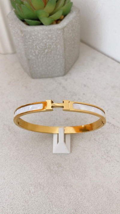 Pulsera Hermes Nácar ACERO DORADO WATERPROOF