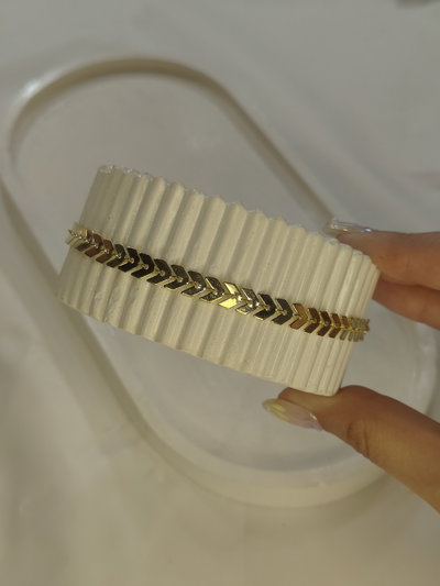 Tobillera flechitas doradas 