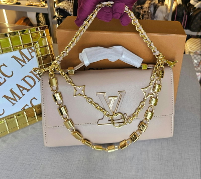 Cartera Louis Vuitton Natural Candados Dorados