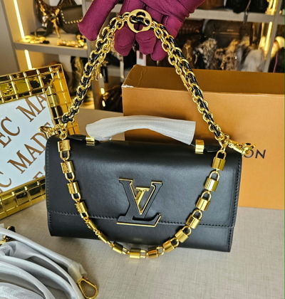 Cartera Louis Vuitton Negra Candados Dorados