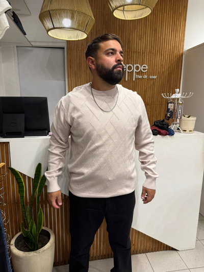 SWEATER CON ROMBOS ROSA