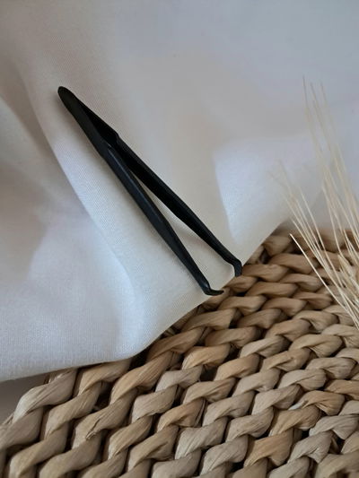 Pinza de depilar
