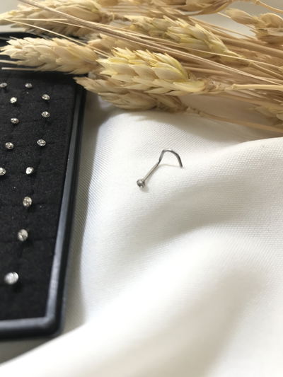 Piercing rulito y strass