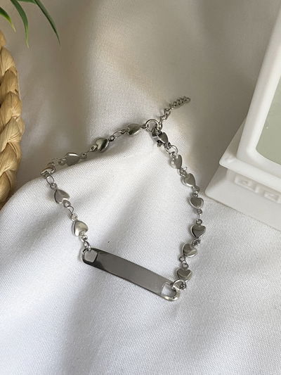 Pulsera chapita y corazones