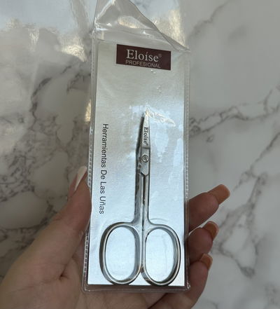 Tijera de cejas 