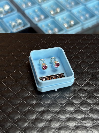 Abridores redondito fuccia 