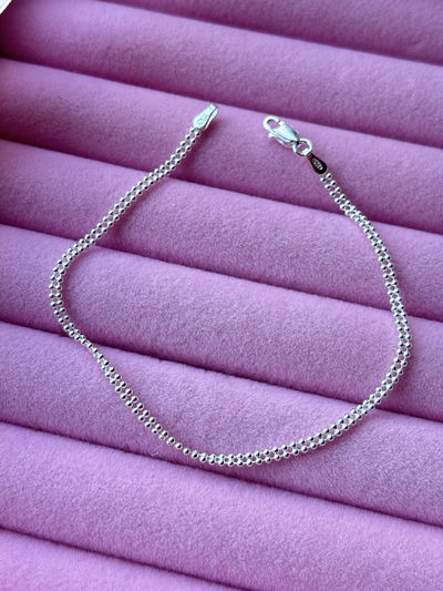 Pulsera doble bolitas