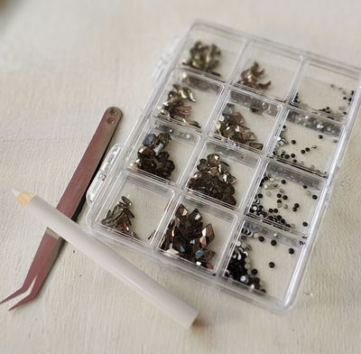 Cristales negros + Pinza + Lapiz