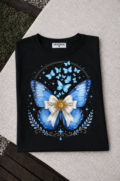 REMERA NEGRA ARG MOÑO MARIPOSA