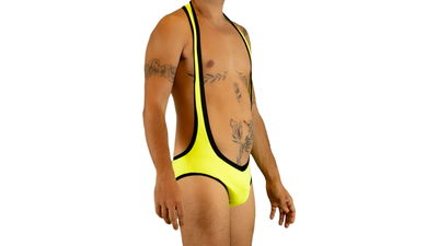 Tiradores slip flúor amarillo detalles en negro