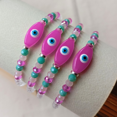 Pulsera elástica Ojito fuscia